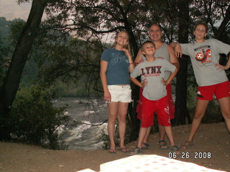 The family camping along the American River