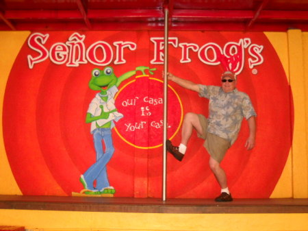Senior Juan pole dancing with Senor Frog