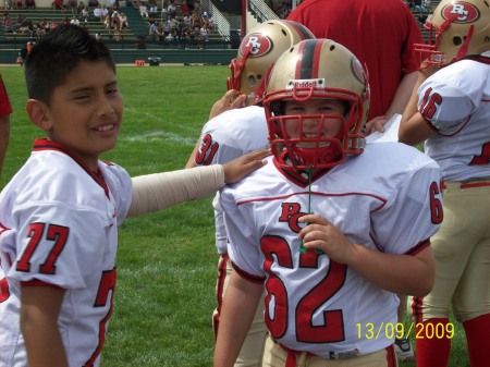 Son Don on the sidelines.