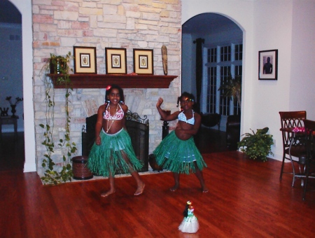 Daughters doin the hula in the kitchen