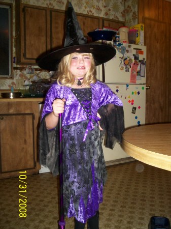 Justine dressed up as a witch.