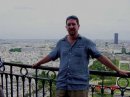 Our 6'4" son Ed on the Eifel Tower - Paris.