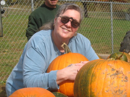 Hugging a pumpkin