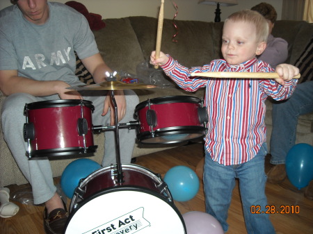 Kaden with his new drum set