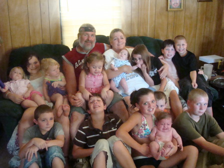 Me, Hubby n some of our grandbabys