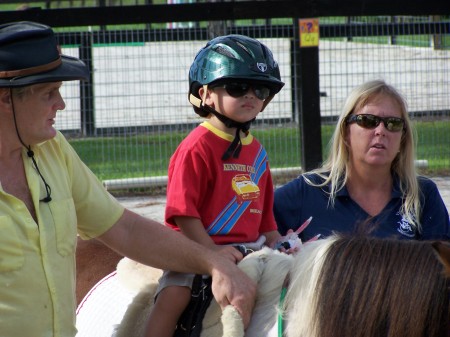 Josh riding on his horse