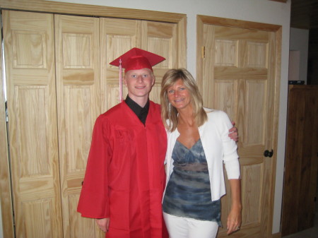 Jodi & Brett, my oldest, graduation day 5-08