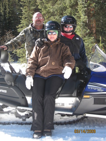 Ray, Gloria & me snowmobiling