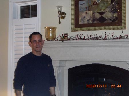 Me, in front of our grand fireplace.