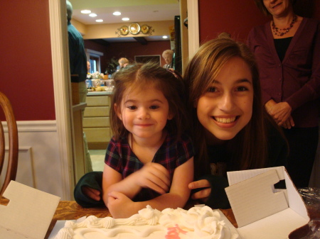 Lindsay and cousin Julia Buhalis with the cake