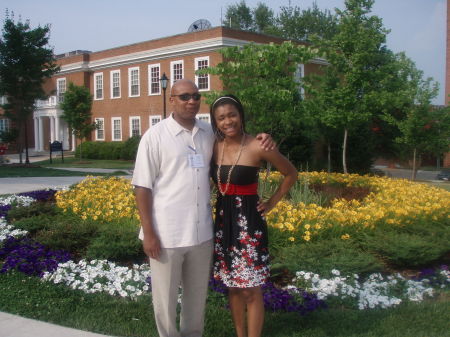 Baby girl 1st college visit standing with dad.