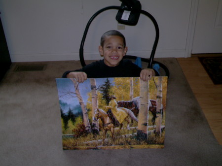 He was so proud of this 750 pc. puzzle he did.