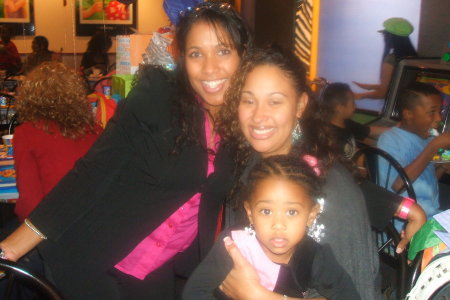 My wife and her best friend Tia with daughter