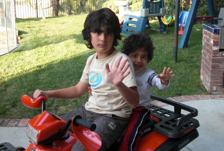Liam & Luca cruising at home