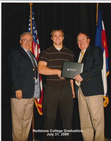 roy recieving diploma from redstone college