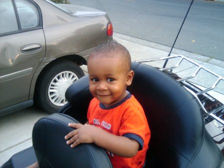 My grandson sitting on my bike!