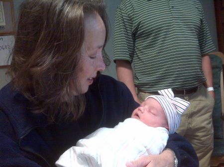 Suzanne holding new granddaughter