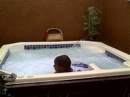 my son at home in the jacuzzi