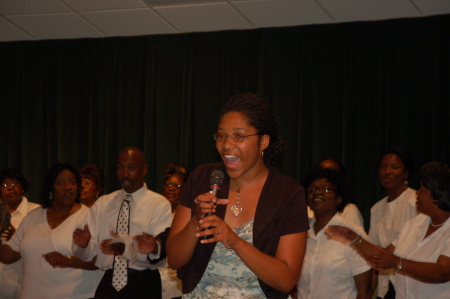 Brittany ministering at the home going