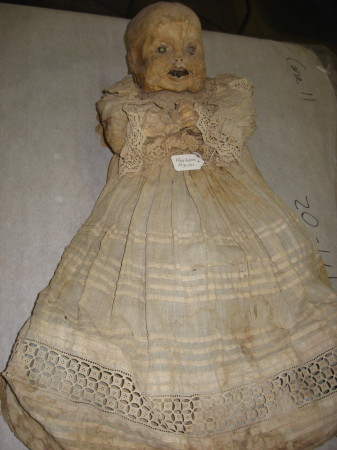 Infant in christening dress