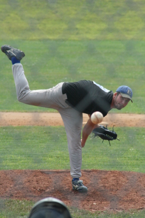 Son pitching for Etown College
