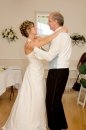 my hubby and first born at her wedding 2008