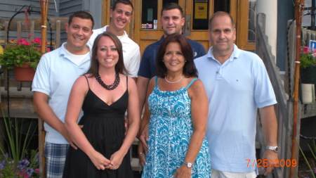 family picture in front of Water's Edge