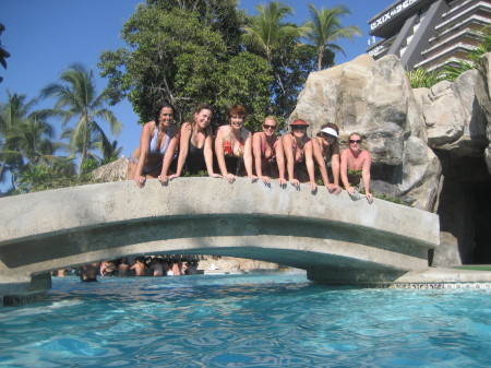 The girls on top of the bridge.