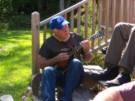 Tom strumming a tune