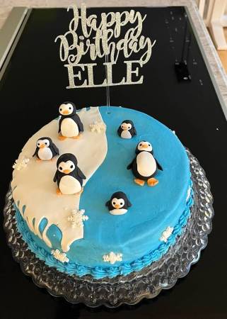 Elle asked for a penguin cake!