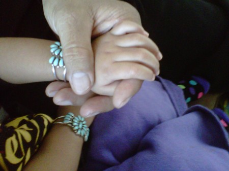 My grand daughters hands and mine
