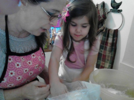 Me and my 3 year old granddaughter cooking together