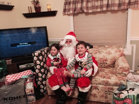 My granddaughter Nicole, Santa my son Jim and my grandson Jack