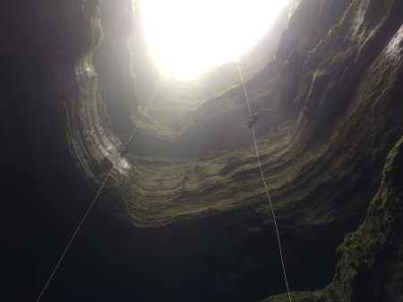 Climbing out of Neversink Pit, AL (162')