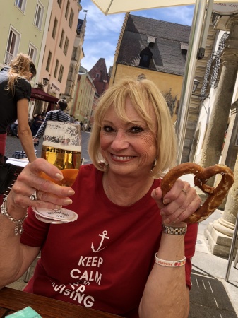 Enjoying a pretzel and German beer, Germany, 2
