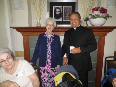Sr. Clara (Marie Tremblay) & new St. Pat's pastor Fr. James Hughes, with a peek at Denise Charpentier in front