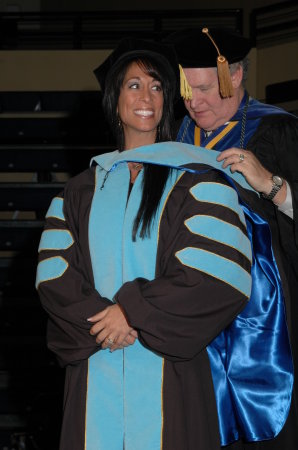 My U.T. graduation, hooding for my PhD (2009)