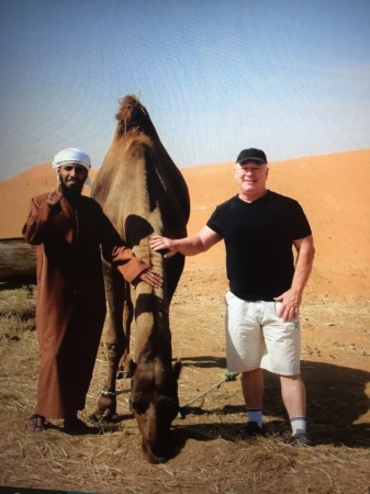 Working in Abu Dhabi, UAE, with camel buddy.