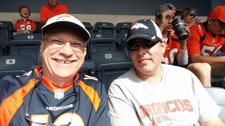 Me and my buddy Steve at a Broncos game