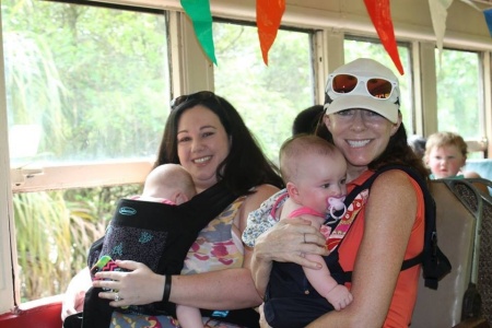 Baby wearing and sharing with Grandma Leslie.