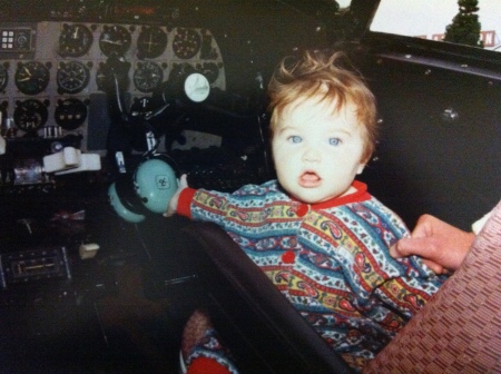 Baby Amy Meltzer circa 1996 completing the before start checklist in a Learstar aircraft. She still has those blue blue eyes.