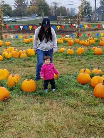 Leah and Vy at a pumpkin patch