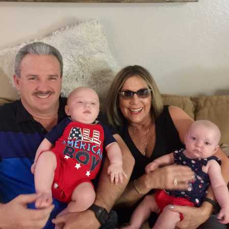 MY HUSBAND AND i WITH THE TWIN GRANDBABIES