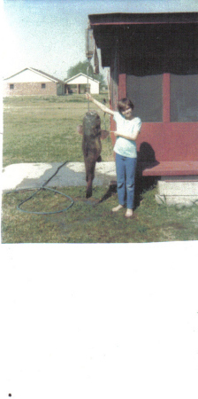 She caught this catfish by herself.