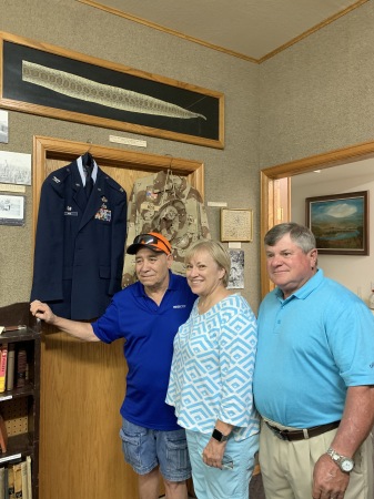 Donating uniforms to Fowler Historical Society