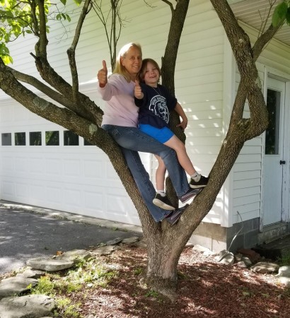 Me & grandson climbing tree