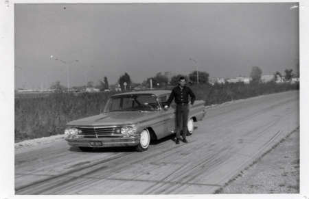 Silver 1960 Pontiac.