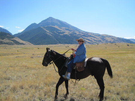 herself in the saddle in Pray, MT