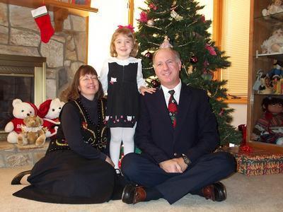 Family photo in the livingroom at Christmas. 