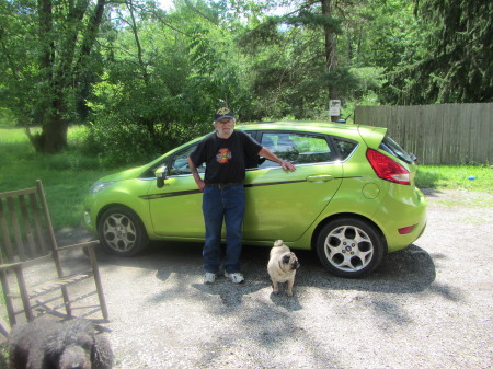 Me 65 y/o,my pug Buddy and my 2011 Ford Fiesta,taken July 2013  Columbia Station,Ohio